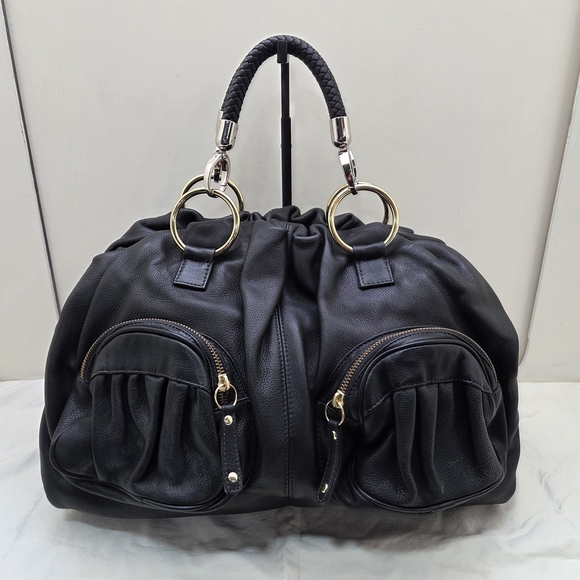 BULGA Handbags - Bulga Black Leather Shoulder Bag | Structured, Statement Interior